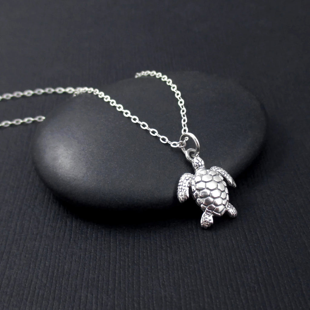 1/6 CT. T.W. Enhanced Black and White Diamond Turtle Pendant in Sterling  Silver | Zales